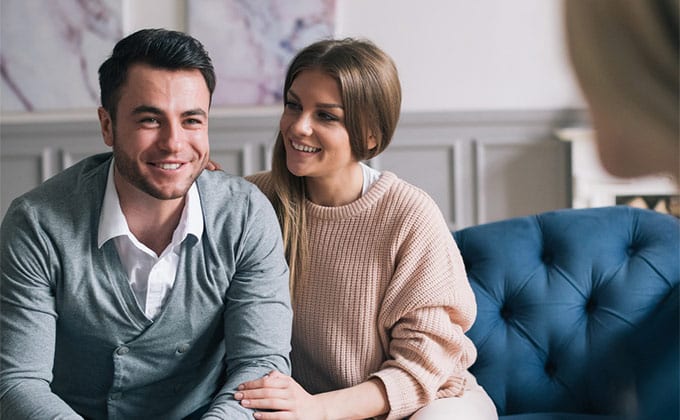 Perth couple meeting real estate agent for house investment