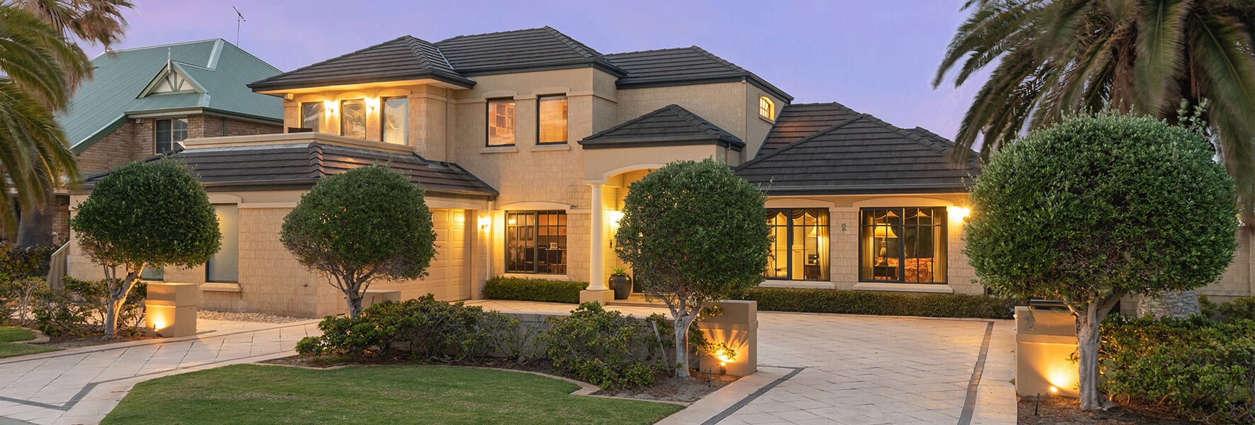 two story villa with driveway